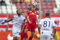 Markus Pink (Klagenfurt) und Rasmus Kristensen (FC Red Bull Salzburg) (c) Schaad FC RBS via Getty Images.jpg